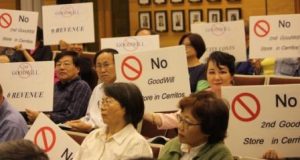 Cerritos residents protest Goodwill during Thursday's city council meeting.