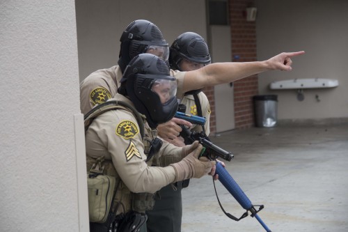 Los Angeles County Sheriff Deputies engage in terrorist active shooter simulation at Gahr High School in Cerritos on Tuesday.  