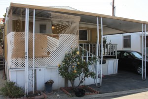 Unit 32 at Norwalk Village Mobile Home Park. Tear gas still lingers from the 8 hour standoff. Daniel E. Beckham Photo. 