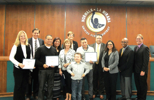 Board President Margarita Rios; Board Vice-President Jesse Urquidi; Board Members Darryl Adams, Karen Morrison, Chris Pflanzer, Sean Reagan, and Ana Valencia with recipients Caryn Cerda, Jimmy Chavez-Perez, Juan Lara, Andrea Woolridge and Kevin Sandoval. Photo by Tammye McDuff.