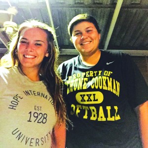 Gahr seniors Brianna Besenty (left) and Deidra Genera proudly don the apparel of their college choice after the two softball standouts signed their respective letters of intent last month.