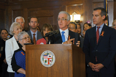 Krekorian-holds-30-round-magazine---now-banned-in-LA