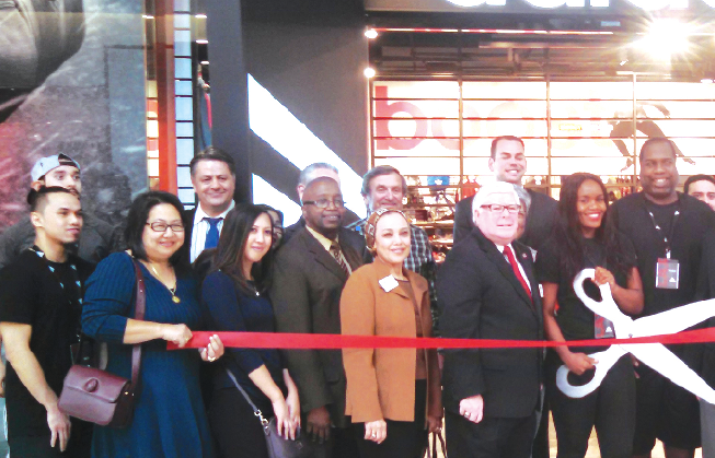 Cerritos Councilman Jim Edwards, third from right, at the ribbon cutting with Adidas management and Cerritos Chamber participants. Photo by Tammye McDuff.