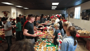 Friends of the 1st CEB Donates $1,000 Towards Christmas Dinner for Marines