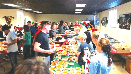 Friends of the 1st CEB Donates $1,000 Towards Christmas Dinner for Marines