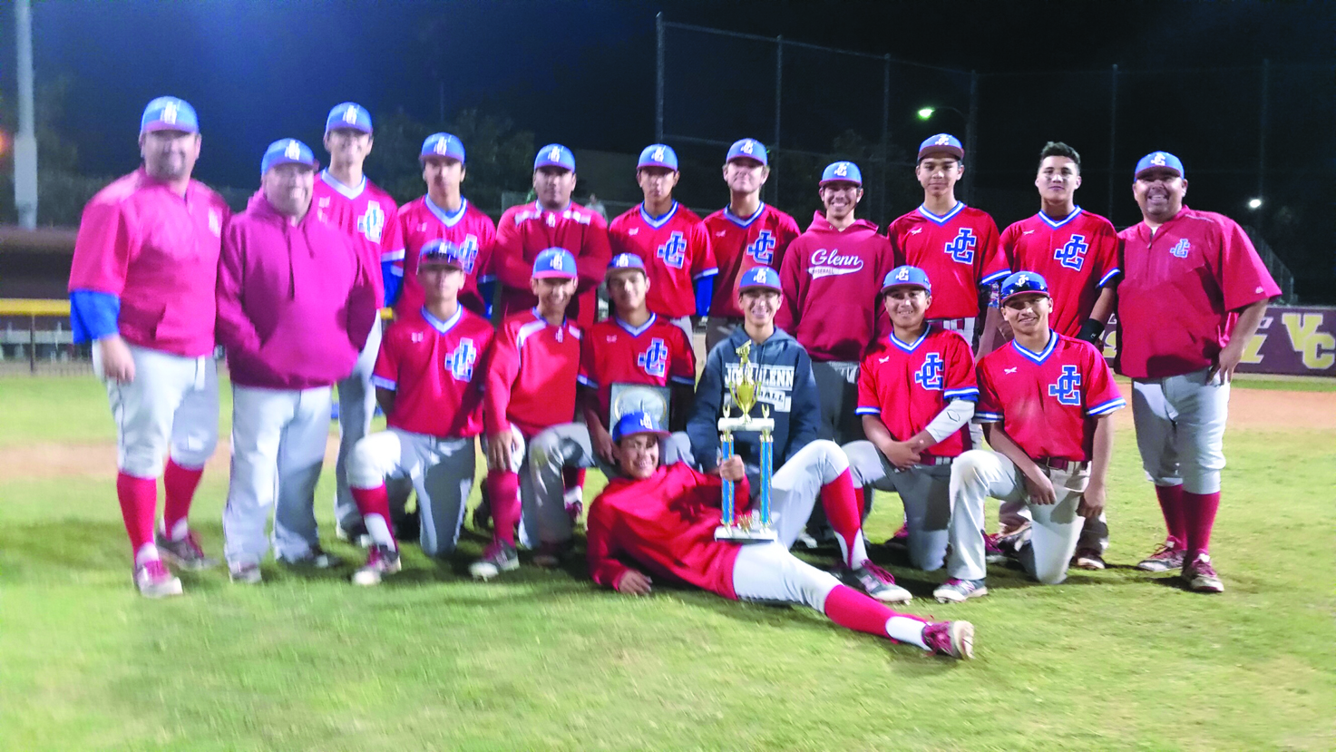 The John Glenn High baseball team poses with the championship trophy after winning the AA Division of the St. Paul Easter Tournament. The Eagles defeated Cerritos High 5-3.