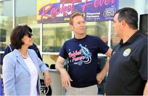 Congresswoman Lucille Roybal-Allard (left) talks with Columbia Memorial Space Center President/Executive Director Ben Dickow (center) and Downey Mayor Alex Saab (right).