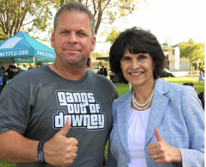 Congresswoman Lucille Roybal-Allard meets with Gangs Out of Downey President and Downey Police Lt. Mark McDaniel, who is wearing Gangs Out of Downey's new t-shirt and logo.