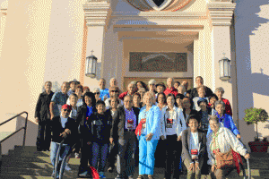 Pictured in front of the modern San Rafael Church in San Rafael, California, are the parishioners of Catholic churches in Orange County and L.A. County who took a Canterbury Pilgrimage trip to the 21 Missions in Alta California.  Pictured in the front row in the center is group leader Ruth Burns. In the last row at far right is Chaplain of the group, Fr Patrick Moses, Pastor of St. Irenaeus Church in Cypress. (Photo courtesy of Habib Aziz.)