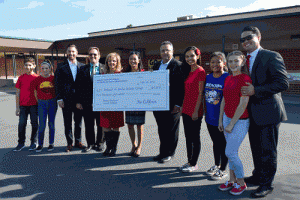 Norwalk-La Mirada Unified Board of Education members, administrators and Benton Middle School students stand with Assemblymember Ian Calderon, who presented a $5,000 grant from the Barona Tribe of Mission Indians on Oct. 26.