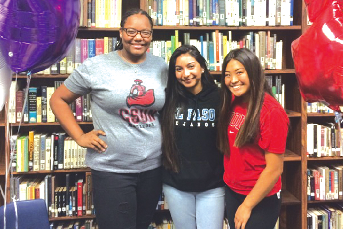 From left to right: Cerritos High softball players Kiarra Crockett-Pope, Kristina Mendez and Jennifer Morinishi recently signed letter of intents to play college softball.