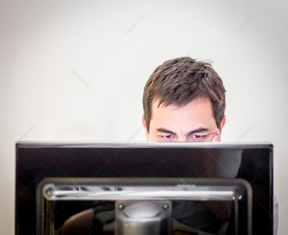 person behind computer screen