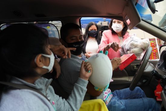 giving backpacks to needy students